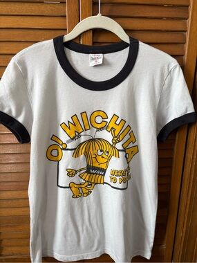 Charlie Hustle Vintage White Ringer Tee with Black Trim, Yellow Wichita Graphic